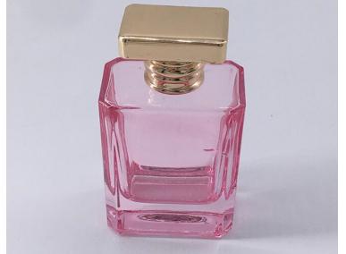 bouteille de parfum rose vide